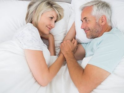 Older Happy Couple Man Looking at Woman